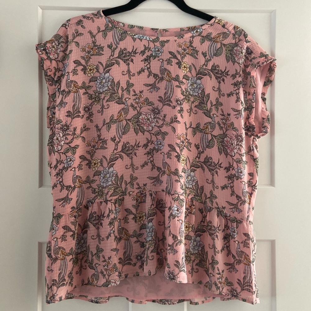 Pink sleeveless blouse